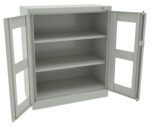 A metal cabinet with two open glass-paneled doors, revealing three empty shelves inside. The cabinet is light gray and simple in design.