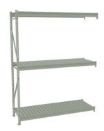 A gray metal shelving unit with three tiers. The shelves are evenly spaced, with vertical support beams on each side. The design is industrial and functional, suited for storage or organization in a warehouse or garage.