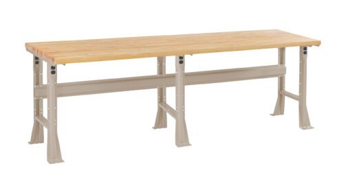 xotzcyp9tqgndcydmmb8.jpg A long, industrial workbench with a light wood tabletop and sturdy metal legs. The bench has a beige metal frame and a minimalist design, suitable for a workshop or garage setting.