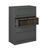 A gray metal filing cabinet with four drawers is shown. The second drawer is open, revealing neatly organized hanging file folders. The first drawer has a lock. The cabinet appears sturdy and functional, designed for office use.
