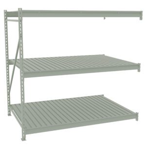 A gray metal storage rack with three shelves. The structure is sturdy with vertical supports and horizontal brackets. The shelves are evenly spaced and ribbed for added strength, suitable for holding various items in a warehouse or garage.