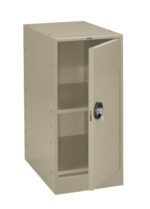A beige metal storage cabinet with an open door is shown, revealing two shelves inside. The cabinet has a lock on the door with a key inserted.