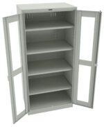 A light gray metal cabinet with double glass-paneled doors is open, revealing five empty shelves inside. The cabinet stands on a flat surface, and the doors have locks on the handles.