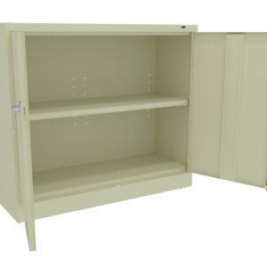 A beige metal cabinet with a single shelf is open, displaying its empty interior. The cabinet has a simple design, with one door fully open to the right and a handle on the left.