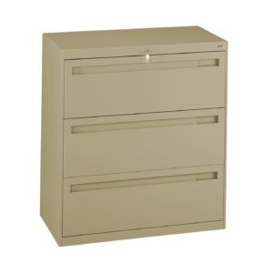 A beige, three-drawer filing cabinet with a lock on the top drawer. The cabinet has sleek, recessed handles on each drawer, and is set against a plain white background.