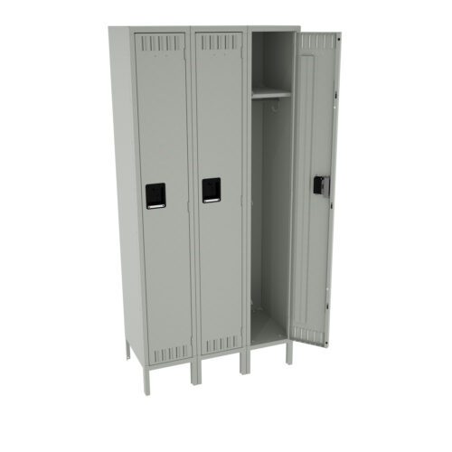 zgffrvsuoma26osbzgdt.jpg A set of three gray metal lockers on legs, with the rightmost locker door open, revealing an empty interior with a shelf and a hook. The two other locker doors are closed and have black handles.