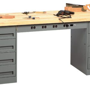 A sturdy workbench with a wooden top and gray metal drawers on both sides. Various woodworking tools, including a saw, clamp, drill, and measuring tape, are placed on the surface. A row of electrical outlets is visible beneath the tabletop.