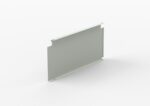 Rectangular metal panel with a smooth, light gray surface. The panel has a series of notches on both horizontal edges and small holes at each corner, likely for mounting or assembly purposes. The background is plain white.