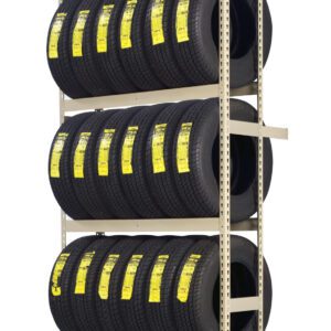 A tall, metal shelving unit holds multiple rows of neatly stacked, black tires. Each tire has a yellow label, and there are five rows in total. The tires are aligned horizontally, filling the shelves completely.