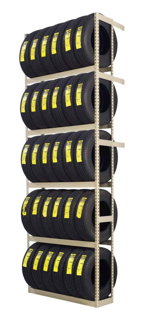 zza5bmw4ger5ztqx3is3.jpg A tall, metal shelving unit holds multiple rows of neatly stacked, black tires. Each tire has a yellow label, and there are five rows in total. The tires are aligned horizontally, filling the shelves completely.