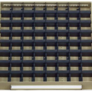 A large grid with numerous small compartments, possibly a key organizer, mounted on a beige frame. The compartments are black, and theres a white horizontal bar at the bottom.