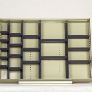 Empty beige shelving unit with adjustable dark gray dividers, set against a plain white background. The shelves vary in size and orientation, allowing for customizable storage options.