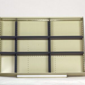 A beige, empty modular display shelving unit with adjustable horizontal black shelves set against a plain white background. The shelves are divided into three rows and three columns, forming a grid-like structure.