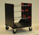 A black mobile cart with four caster wheels, featuring three horizontal metal rods with red holders. The rods are adjustable along vertical slots on the sides. The cart is on a light background.