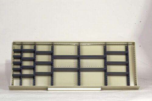 Empty beige shelving unit laid horizontally against a white background. The unit has multiple rows with dark gray dividers and a clean, minimalist design.