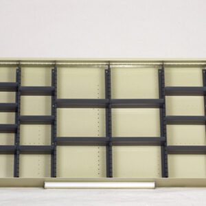 A beige wooden shelf with multiple compartments, designed for organizing items. The shelf has evenly spaced vertical and horizontal dividers of varying sizes, creating a grid pattern against a plain white background.