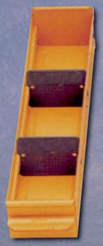 A long, narrow yellow container with two dark dividers inside placed against a gray background. The container appears to be made of plastic and has ridged edges.