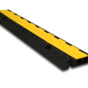 Check out the TCT 3 - Channel Light Duty Cable Protector—a durable black and yellow design with a textured surface. Its long, rectangular shape with a hinged cover is perfect for organizing cables or hoses and ensuring vehicle safety as they pass over.