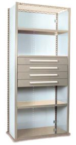 A tall metal cabinet with glass doors, featuring two shelves, four drawers in the center, and a grid-style top section. The cabinet is open and empty, showcasing beige and silver-colored finishes.