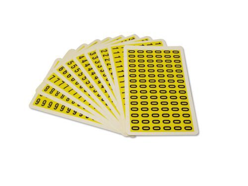 F220PACK200-9.jpg A fanned set of MH-USA Complete Packs of Self-Adhesive Numbers in yellow, with black numbers and symbols, is displayed on a white background. The front card features a grid of black ovals, dimensions: H.0.33 in. x W.0.49 in.