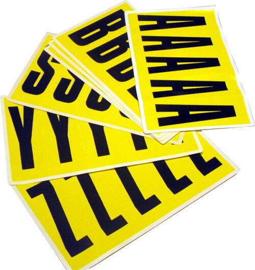 Stacks of yellow sheets show large black letters like A, B, Y, Z, and S neatly arranged on a white surface. These are MH-USA Complete Packs of Self-Adhesive Letters, each measuring H.1.77 in. x W.5.12 in., perfect for creative projects.
