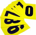 The MH-USA Complete Packs of Self-Adhesive Numbers include large black numbers from 0 to 10 on white cards, measuring H.5.51 in. x W.9.06 in., set against a vibrant yellow background for standout visibility.