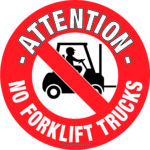 A red circular sign with a white border displaying Attention No Forklift Trucks and a crossed-out forklift illustration, this MH-USA Floor Graphic Marker, 16.93 in. dia., clearly indicates forklifts are not allowed in the area.