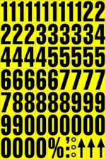 Bold black numbers from 1 to 9, repeated in a grid on a yellow background, designed using MH-USA Magnetic Mixed Numbers - H.1.69 in. Below are five zeros, percentage sign, forward slash, colon, apostrophe, and three upward arrows.