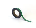 A roll of the MH-USA Magnetic Easy-Wipe Strip in green is laid on a white background, showcasing its length extending gracefully to the right.