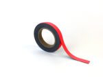 A roll of MH-USA Magnetic Easy-Wipe Strip in red, dimensions 0.79 inches by 3.94 inches, with a black underside, is partially unspooled and curls upwards against a plain white background. The center is made from brown cardboard.