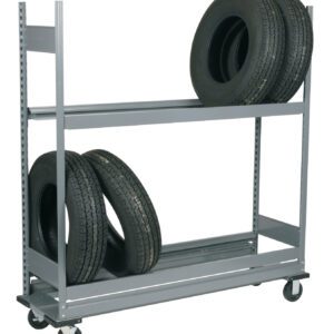 A gray metal shelving unit on wheels holding four car tires. Three tires are on the bottom shelf, one propped up against two lying flat, and one tire is on the top shelf, placed upright. The unit is in an empty space.