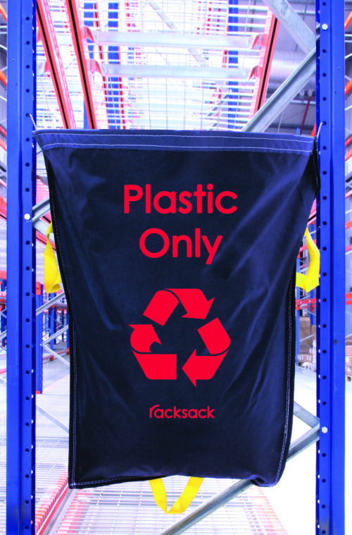 RSB1-P.jpg A black MH-USA Racksack - Plastic Only bag, featuring a red recycling symbol, hangs on a blue metal rack in an industrial space. The Racksack brand is prominently displayed with steel shelves and a ceiling grid in the backdrop.