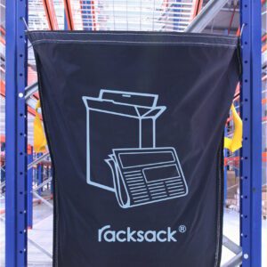 A blue MH-USA Racksack for Mixed Paper and Card hangs on a warehouse metal shelf, featuring a white cardboard box and newspaper icon with yellow side handles.