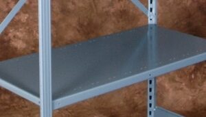 A metal shelf with a single grey horizontal panel is set against a textured brown background. Ideal for powersports inventory management, the frame consists of vertical and diagonal metal supports, featuring a perforated design for adjustable shelving.