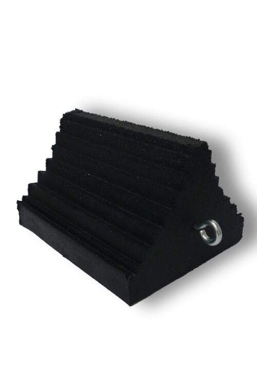 The TCT Triangle Heavy-Duty Wheel Chock - Ribbed Double Sided Black (10x8x6) has a ribbed, double-sided black surface for enhanced grip, a sturdy metal ring, and effectively prevents vehicle movement. It is featured against a plain white background.