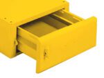 A bright yellow metal drawer is partially open, revealing the inside. The drawer appears to be part of a larger piece of furniture or storage unit.