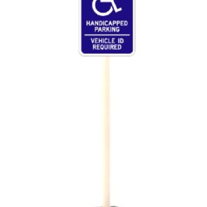 A blue handicapped parking sign with a wheelchair symbol and HANDICAPPED PARKING VEHICLE ID REQUIRED text on a white pole secured in a durable TCT Octagon Sign Base, 30Lbs.