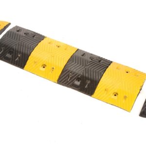 The TCT 5-10 MPH Speed Bump features alternating yellow and black sections with two half-circle end pieces, and measures 13.5 wide, 39.25 long, and 2 tall in the middle.