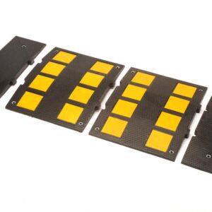 A black modular TCT 10-15 MPH Speed Hump middle section with yellow panels, measuring 18 3/4 wide x 24 long x 1 1/8 tall, is set against a white background.