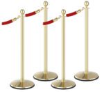 Four Visiontron Prime Ball Top Stanchion Bundles with red ropes form a zigzag pattern, hooking onto polished gold poles to create an elegant barrier against a crisp white background.