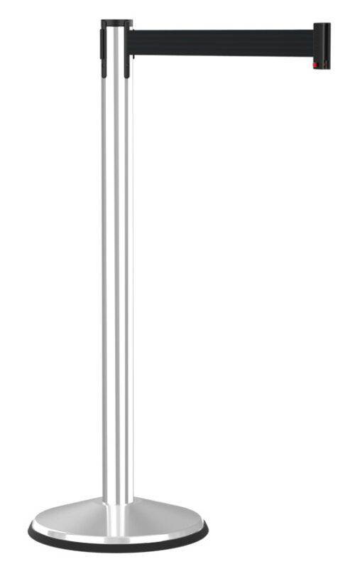 A silver metal stanchion with a black retractable belt extended outward to the right. The base is round and provides stability for the upright pole. The overall design is sleek and modern, commonly used for crowd control or line management.