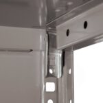 Close-up of a metallic shelving unit corner, showing the joint and bracket structure with several holes on angled metal bars, used for assembly and support. The surface has a shiny gray finish.