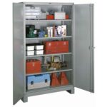 A metal storage cabinet with open doors reveals five shelves containing various tools, plastic bins, red toolboxes, cans, and a small machine. The shelves are organized with items for industrial or mechanical use.