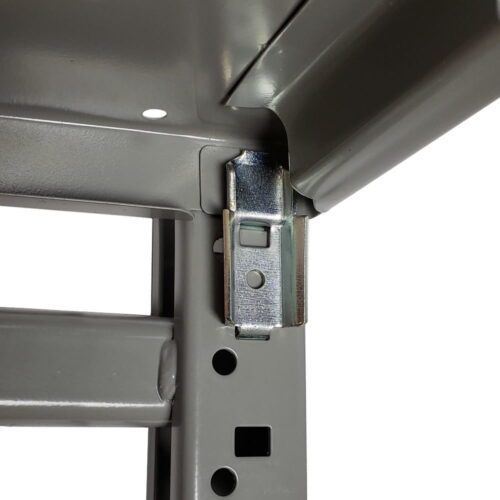 Close-up of a metal shelving units corner, showing a shiny metal connector piece. The shelves are gray with holes along the side for adjustable height. The image highlights the sturdy construction of the shelving system.