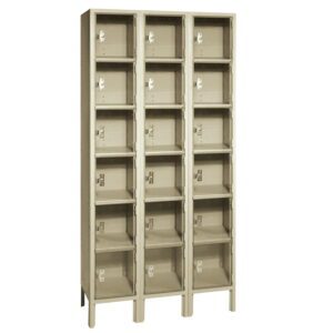 A beige-colored, three-column metal locker unit with four stacked compartments per column. Each compartment has a ventilation slot and a metal handle latch for securing, resting on short legs for stability.