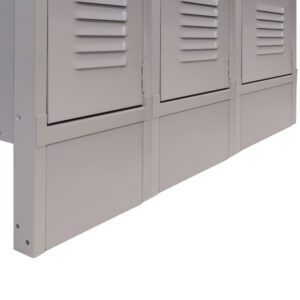 Close-up of the bottom section of beige metal lockers with ventilation slots. The lockers are aligned side by side, showcasing a clean and industrial look. The focus is on the lower part of the locker doors and surrounding framework.