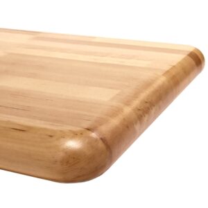 Close-up of the corner of a light-colored wooden cutting board with a smooth, rounded edge. The wood grain is visible on the surface, highlighting its natural texture and finish.