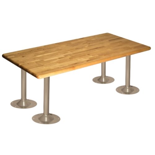 A wooden rectangular table with a polished surface. It has four sturdy metal pedestal legs with round bases, providing a modern and industrial look. The table stands alone on a white background.