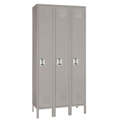 lyon-metal-locker-single-tier-three-wide-dove-gray.jpg A set of three tall gray metal lockers, each with a vented door and a handle. The lockers are standing side by side, elevated on short legs.