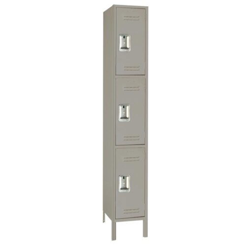 A tall, narrow, gray metal locker with three stacked compartments, each featuring a vented door and a handle. The locker stands on four short legs.